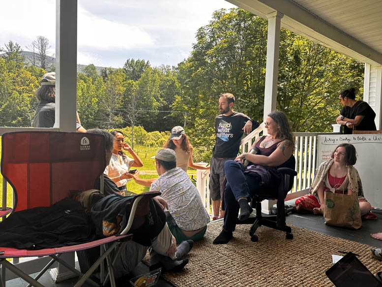 Future Lab participants sharing a conversation on the porch